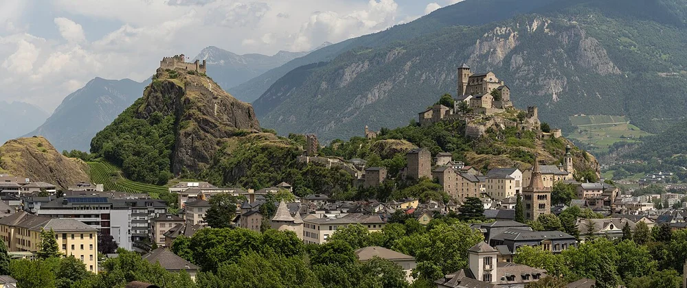 Panorama of Sion with Tourbillon Castle and Valère Basilica.